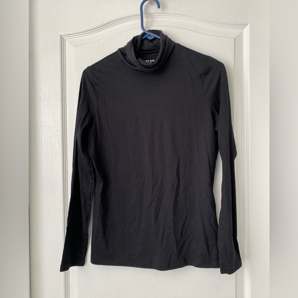 Lands End. Size small. Turtle neck. Shaped fit long sleeve black shirt.